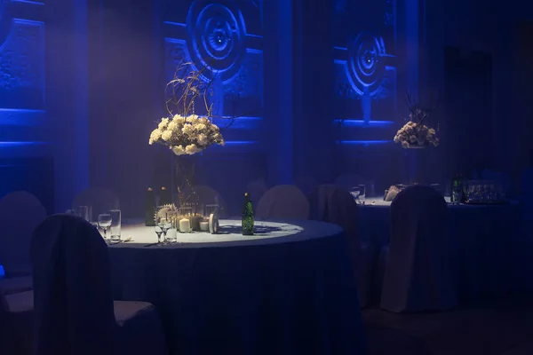 Banquet room in a blue haze