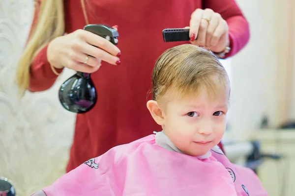 Haircut a little boy — Stock Photo, Image