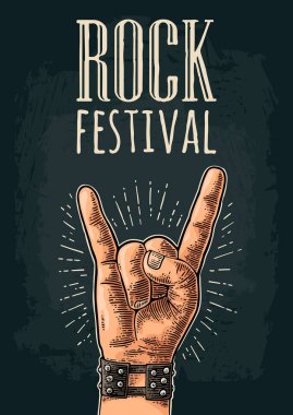 Rock and Roll işareti. Vektör siyah vintage oyulmuş çizim.