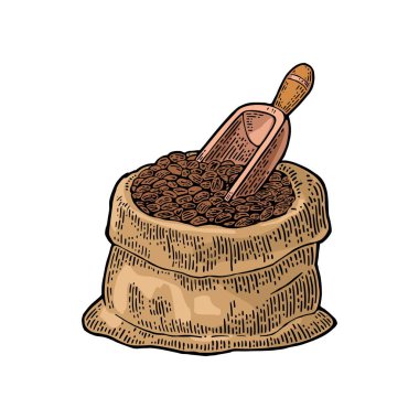 Kahve çekirdekleri ile ahşap kepçe ile çuval.