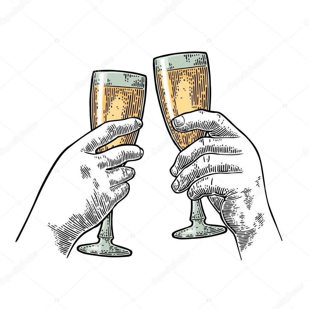 Female and male hands holding and clinking two glasses champagne.