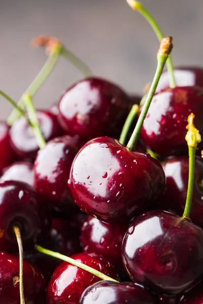 Fresh cherry on a table with water drops. Macro Stock Picture