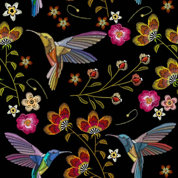 Humming bird and tropical flowers embroidery seamless pattern