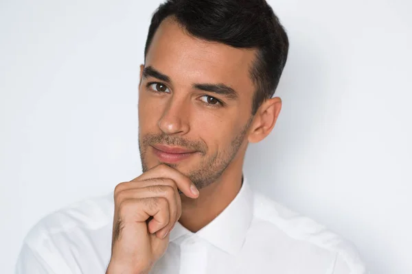 Close-up portrait of stressed handsome young man hand on head wi — Stock Photo, Image