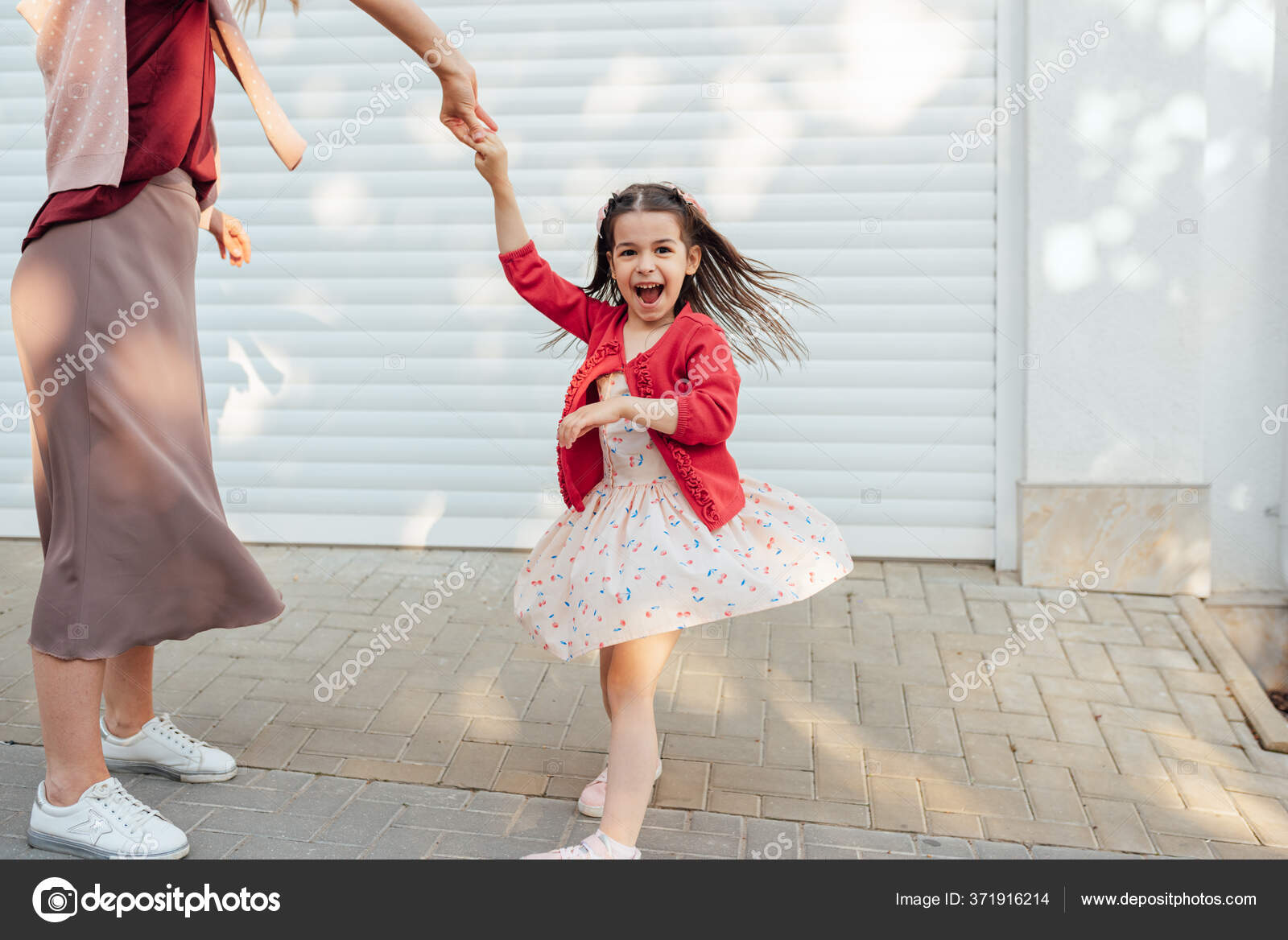 depositphotos 371916214 stock photo happy little girl laughing dancing