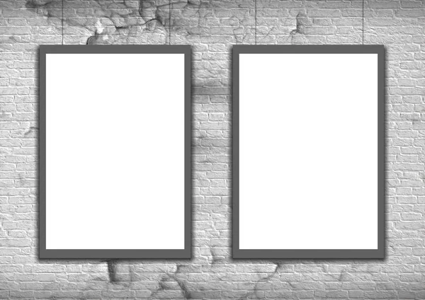 White Blank Posters in crack brick wall 
