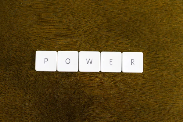 Poder Palavra Escrita Plástico Teclado Alfabeto Com Fundo Escuro — Fotografia de Stock