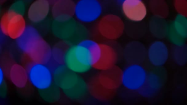 Des particules en mouvement. Coloré, flou, fond bokeh lumières . — Video