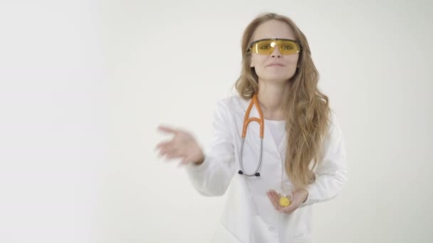 Happy woman doctor with stethoscope sending an air kiss — Stock Video