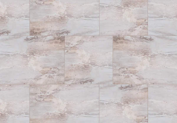 Beige tiled texture. Tiled background for the design of decorati
