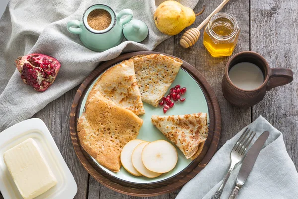 Traditional russian breakfast pancakes, coffee, berry, honey. Springtime.  Shrovetide. Stock Photo by ©Svetlana_Cherruty 332005026