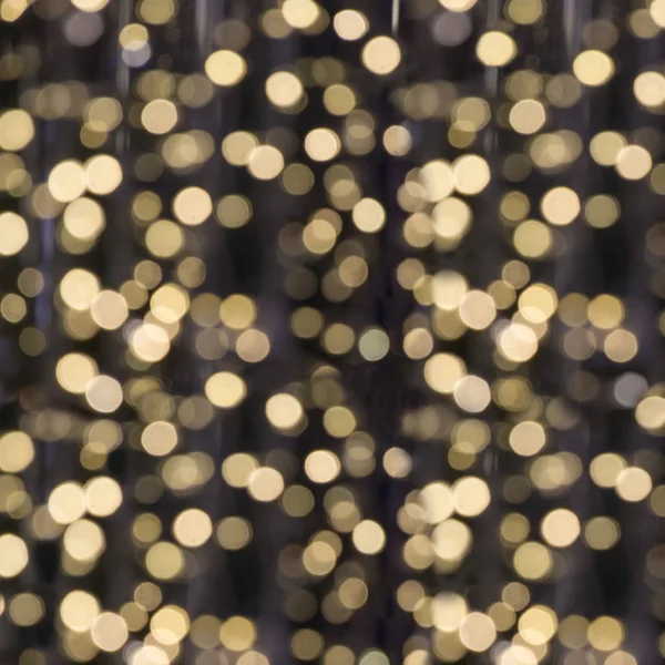 Blurred garland. City light blur bokeh, defocused background. Christmas abstract. — Stock Photo, Image