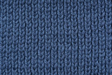 Doku el yapımı örgü. Yakın çekim. Duvar kağıdı veya soyut arka plan.