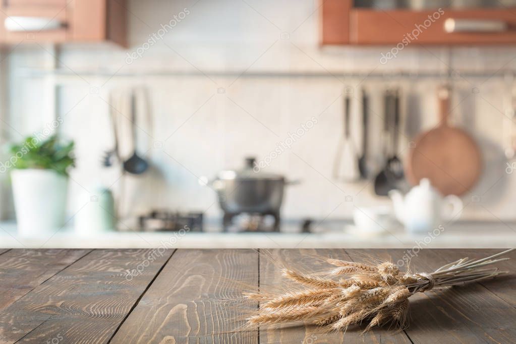 Blurred abstract background. Modern kitchen with tabletop and space for display your products.