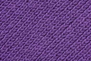 Doku el yapımı örgü. Yakın çekim. Duvar kağıdı veya soyut arka plan.