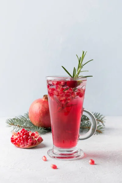 Pomegranate christmas punch with rosemary — Stock Photo, Image