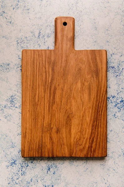 A wood textured oak dark brown cutting board. — Stok fotoğraf