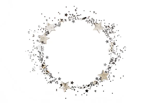 Silver glitter, confetti, sequins and star. Holiday frame — Stock Photo, Image