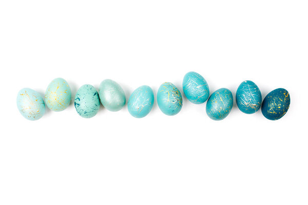 Row of ombre blue  Easter eggs isolated on white background