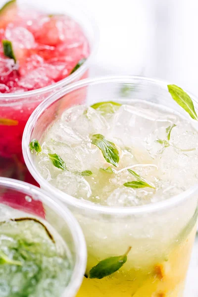 Fruit summer drinks with ice — Stock Photo, Image