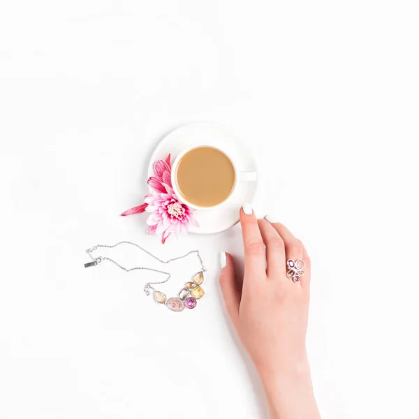 Female hand and coffee cup — Stock Photo, Image