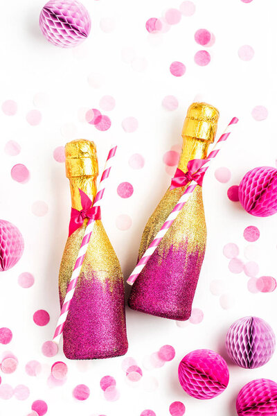 champagne bottles with honeycomb balls