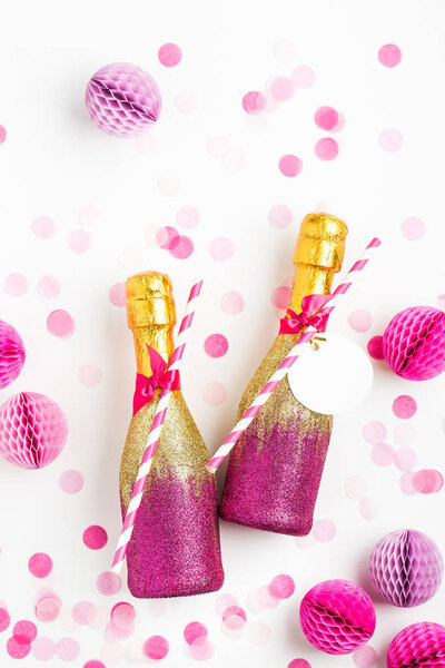 champagne bottles with honeycomb balls