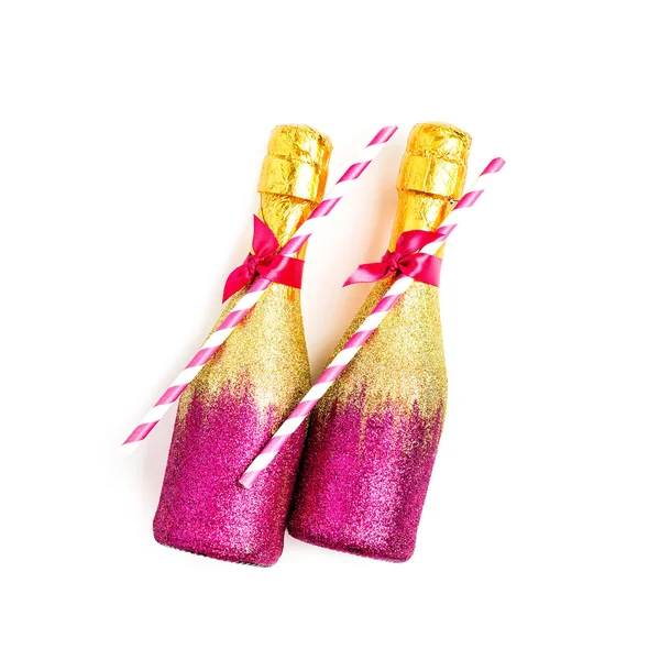Zlaté a růžové šampaňské láhve — Stock fotografie