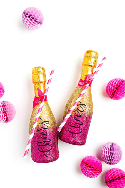 champagne bottles with honeycomb balls