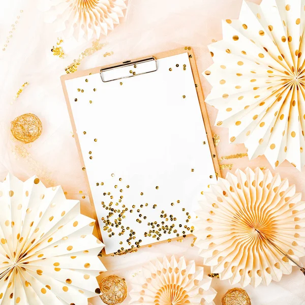 Clipboard with golden decorations