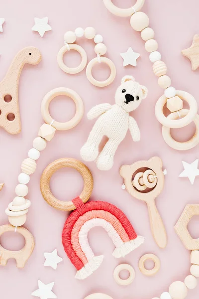 Cute Wooden Baby Toys Pink Background Knitted Bear Rainbow Dinosaur — ストック写真