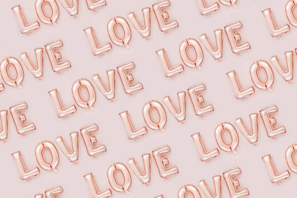 Χλωμό Ροζ Foil Μπαλόνια Σχήμα Της Λέξης Αγάπη Παστέλ Φόντο — Φωτογραφία Αρχείου