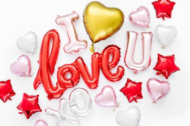 Red and pink Foil Balloons in the shape of the word 