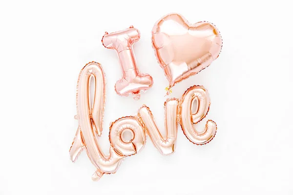 Χλωμό Ροζ Foil Μπαλόνια Σχήμα Της Λέξης Αγάπη Καρδιές Λευκό — Φωτογραφία Αρχείου