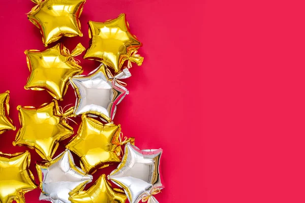 Gold Silver Foil Balloons Star Shaped Red Background Holiday Celebration — Stockfoto