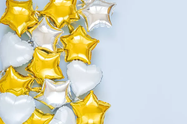 Gold Silver Foil Balloons Star Shaped Blue Background Holiday Celebration — 图库照片