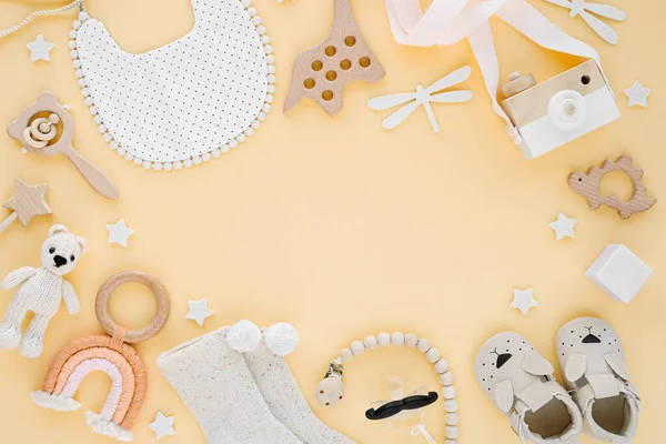 Toys Bib Socks Slippers Newborn Yellow Background Frame Made Gender — Stock Photo, Image