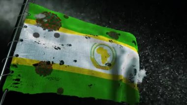 Afrika Birliği bayrağı yırtılmış ve covid-19 veya corona virüsü ile işaretlenmiş.