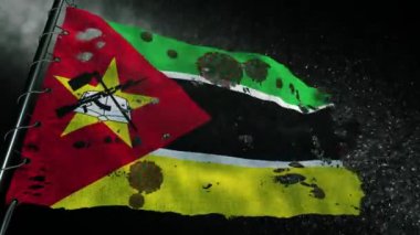 Mozambik bayrağı, covid-19 ya da corona virüsüyle yırtılmış ve işaretlenmiş.