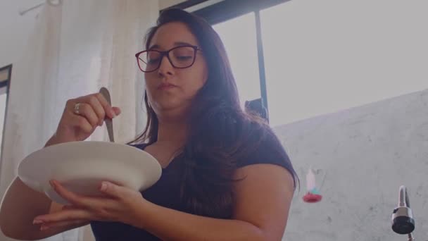 Woman Kitchen Tries Pasta She Made — Stock Video