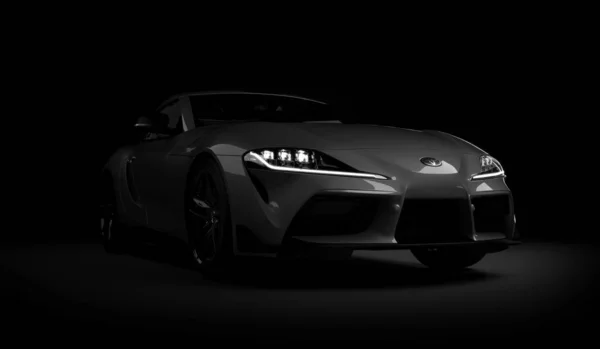 Almaty, Kazajstán. 15 de noviembre: coche deportivo rápido Toyota supra GR sobre fondo negro. Renderizado 3D — Foto de Stock