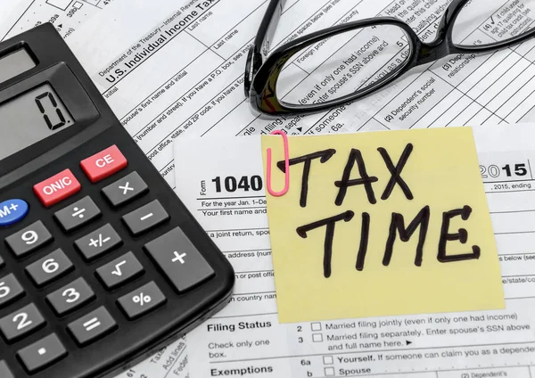 Tax form with callculator and glasses — Stock Photo, Image