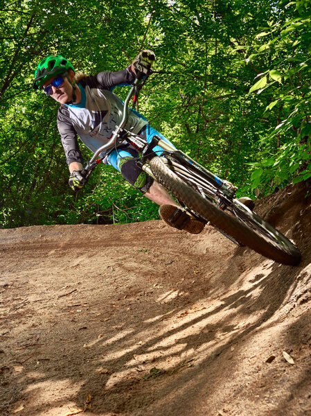 Cyclist rides in turn