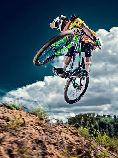 Jump and fly on a mountain bike