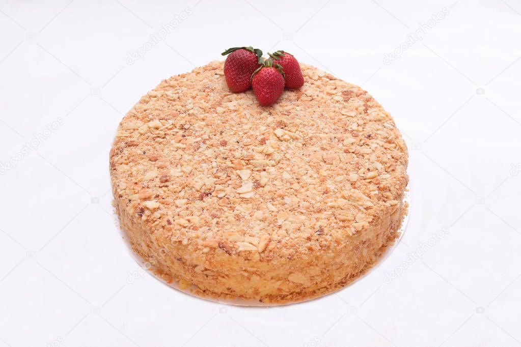 Cake Napoleon with strawberries isolated on a white background