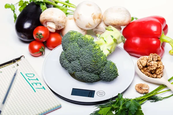 Weigh products on electronic kitchen scales and record the results. The concept of healthy eating, diet, calorie counting, eating restrictions