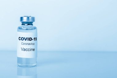 Coronavirus aşısı. Tıbbi konsept. Uzayı kopyala, Mavi tonlama