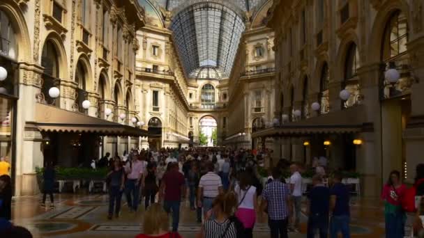 People walk inside shopping gallery — Stock Video
