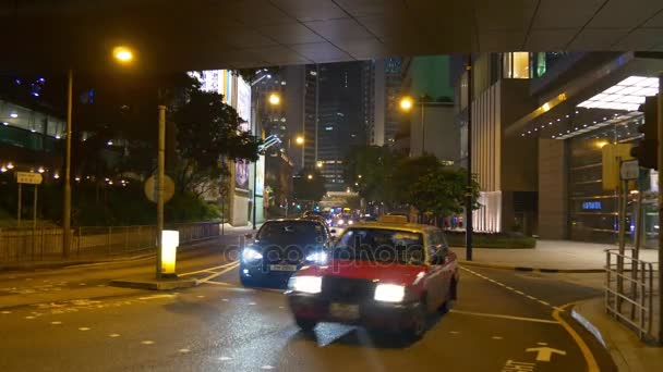 Ciudad de Hong Kong iluminada por la noche — Vídeo de stock