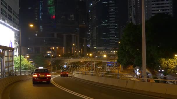 Ciudad de Hong Kong iluminada por la noche — Vídeos de Stock